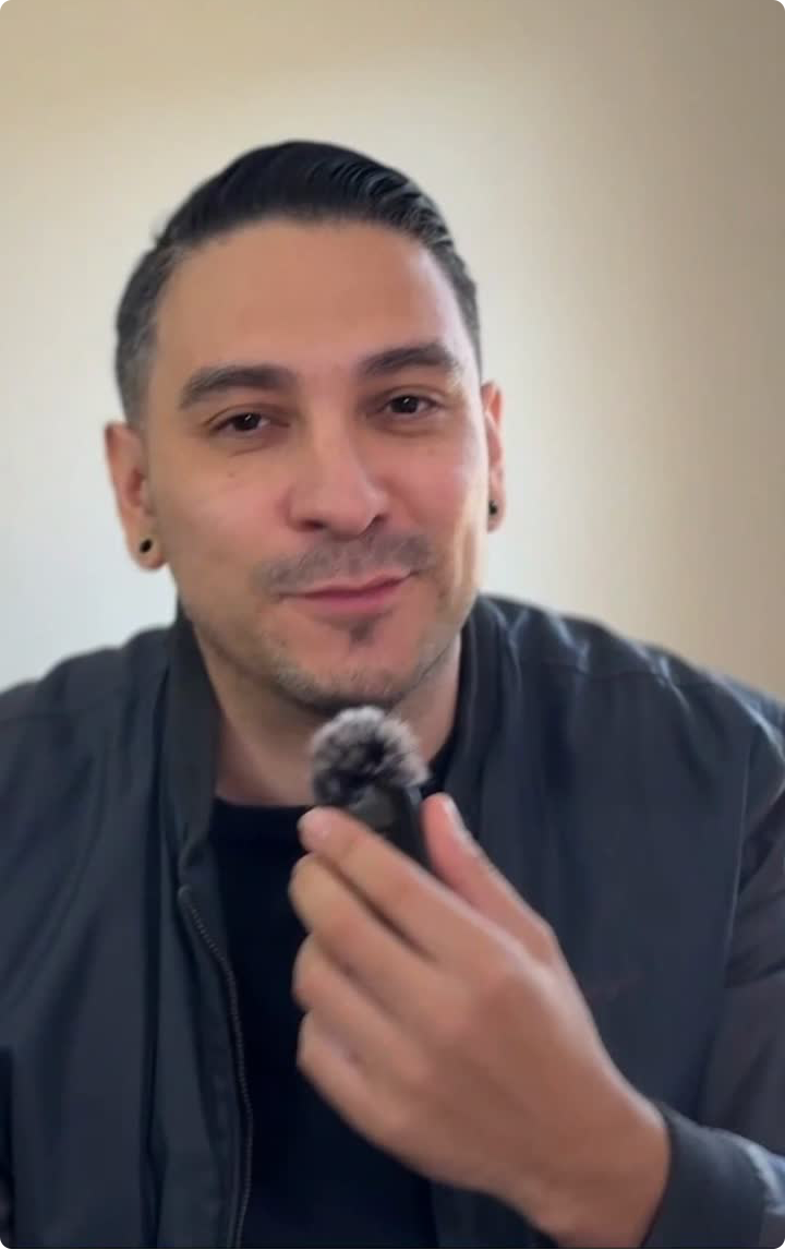 chris upg creator talking into microphone